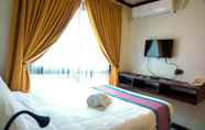 Bilik Tidur 5 Veranda Suites and Restaurant