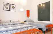 Kamar Tidur 4 YO.OM Colorful Family Home 3 Pax