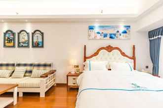 Phòng ngủ 4 Western Theme Holiday Apartment Hotel