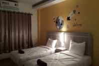 Bedroom Silayok Grand Hotel