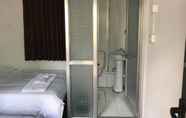 Kamar Tidur 4 Beijing 123 Holiday Hotel