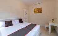 Kamar Tidur 6 Calma Holiday Villas