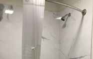 In-room Bathroom 3 Super 8 by Wyndham Palestine