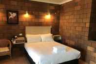 ห้องนอน Malanda Lodge Motel