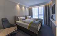 Bedroom 3 Holiday Inn Express Luzern - Kriens, an IHG Hotel