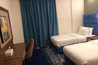 Kamar Tidur Swiss Blue Hotel Jazan