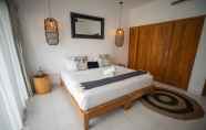 Kamar Tidur 6 Ohana's Beachfront Resort & Beach Club