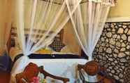 Kamar Tidur 4 Plumeria Luxury Villas Udawalawe