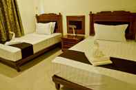 Kamar Tidur The Premiere Business Hotel