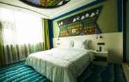 Bedroom 4 Fun-loving Theme Hotel of Tengchong