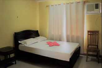 Kamar Tidur 4 Sarmiento Guesthouse