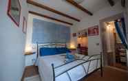 Kamar Tidur 6 Pietra Di Mare Guest House