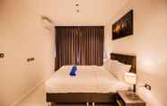 Bedroom 5 The Point Pratumnak by PSR ASIA