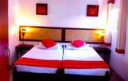 Kamar Tidur 4 Yoho Lagoonside Holiday Bungalow