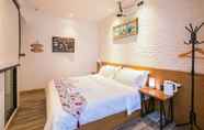 Kamar Tidur 7 Maan Coco Travelling Boutique Inn