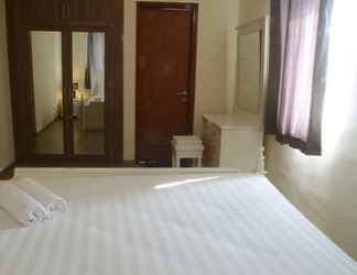 Bedroom 2 Luxury Design Grand Palace Kemayoran Apartment With Private Bathtub