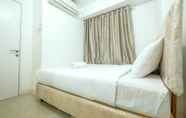 Bedroom 7 Cozy Bassura City Apartment