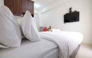 Bedroom 4 Comfy Studio Apartment @ Green Pramuka City