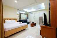 Kamar Tidur Simply Spacious Studio Room at City Home Apartment near Kelapa Gading