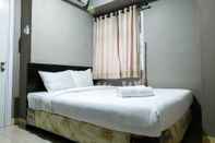 Kamar Tidur Pool View Green Pramuka Apartment