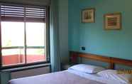 Bedroom 2 Hotel Le Pleiadi