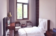 Phòng ngủ 4 Fragrant Hills Holiday Business Hotel