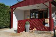 Exterior Camping Les Lacs de Courtes - Chalets