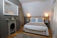 Kamar Tidur Orchard Cottage