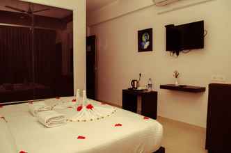 Kamar Tidur 4 Leela Backwaters Inn