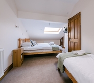 Bedroom 7 The Victorian Barn self catering holidays with pool & hot tubs