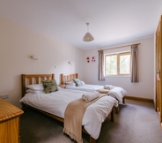 Bedroom 5 The Victorian Barn self catering holidays with pool & hot tubs