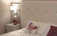 Bilik Tidur 7 Apart-Hotel La Rocchetta