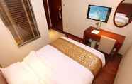 Kamar Tidur 5 GreenTree Inn ShangHai SongJiang WanDa Plaza RongMei Road Express Hotel