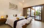 Kamar Tidur 7 Echo Beach Villa & Apartment