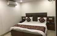 Bedroom 4 Hotel Avtar At New Delhi Railway Station