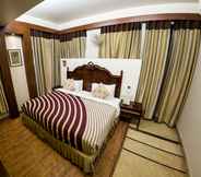 Kamar Tidur 6 A&M Ressidency