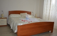 Kamar Tidur 3 La Rosa Bed & Breakfast