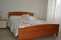 Kamar Tidur La Rosa Bed & Breakfast