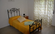 Kamar Tidur 7 La Rosa Bed & Breakfast