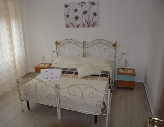 Kamar Tidur 2 La Rosa Bed & Breakfast