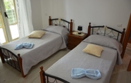 Kamar Tidur 6 La Rosa Bed & Breakfast