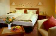 Bedroom 3 Garni Hotel & Ferienwohnungen Seeschlößchen