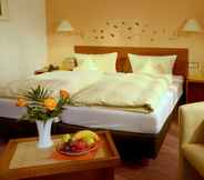 Phòng ngủ 3 Garni Hotel & Ferienwohnungen Seeschlößchen