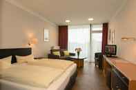 Bedroom Garni Hotel & Ferienwohnungen Seeschlößchen