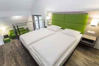 Kamar Tidur 4 Hotel Holzscheiter