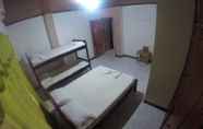 Bedroom 3 Tauma Hostal & Camping