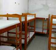ห้องนอน 6 Tauma Hostal & Camping