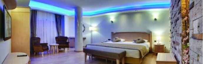 Kamar Tidur 4 Blue City Boutique Hotel