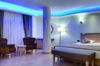 Kamar Tidur Blue City Boutique Hotel