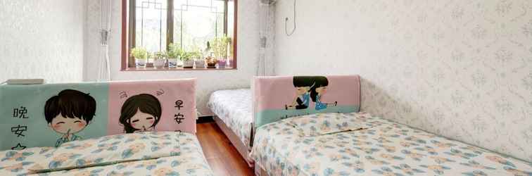 Kamar Tidur Gubei Water Town Vacation Apartment